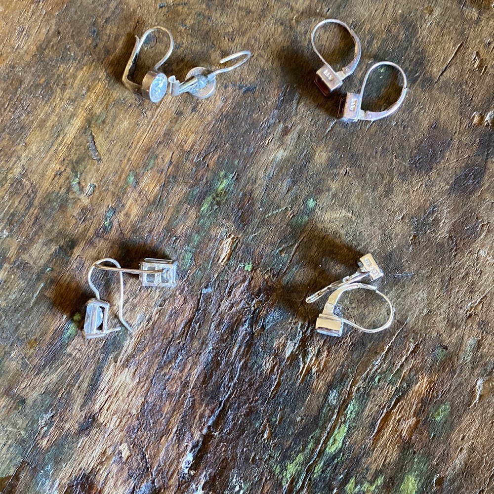 Four pairs of sterling silver earrings